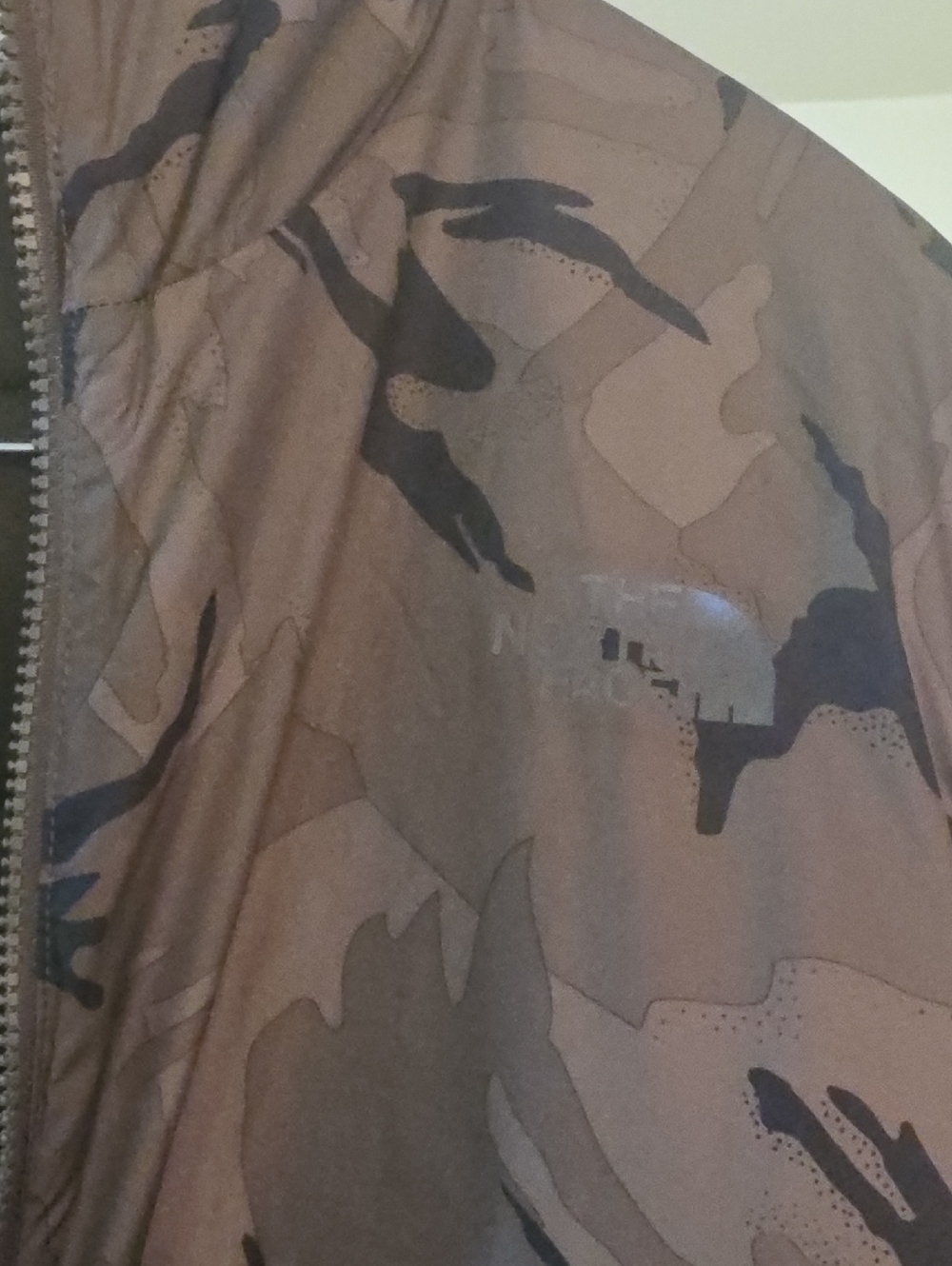 The North Face Brown Camouflage Jacket with Black Accents